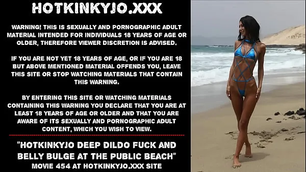 Show Hotkinkyjo deep dildo fuck and belly bulge at the public beach drive Videos